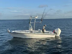 Captain Dave chumming from his vessel