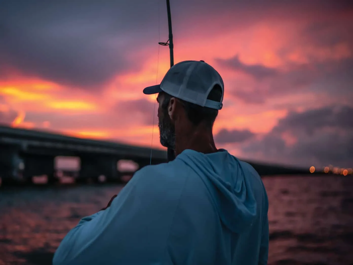 Captain Dave fishing at sunset