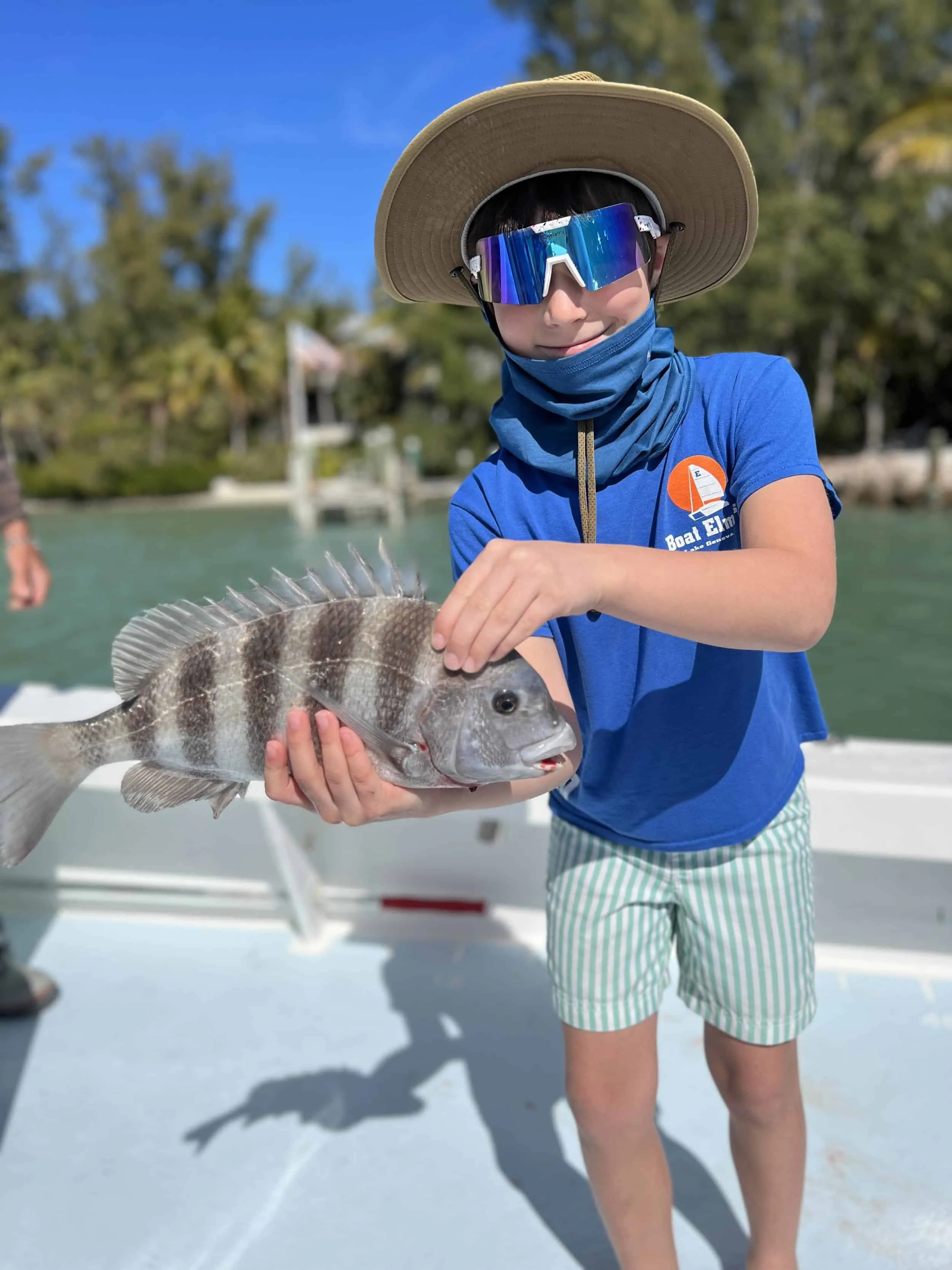 Client with an inshore catch aboard Captain David White's charter