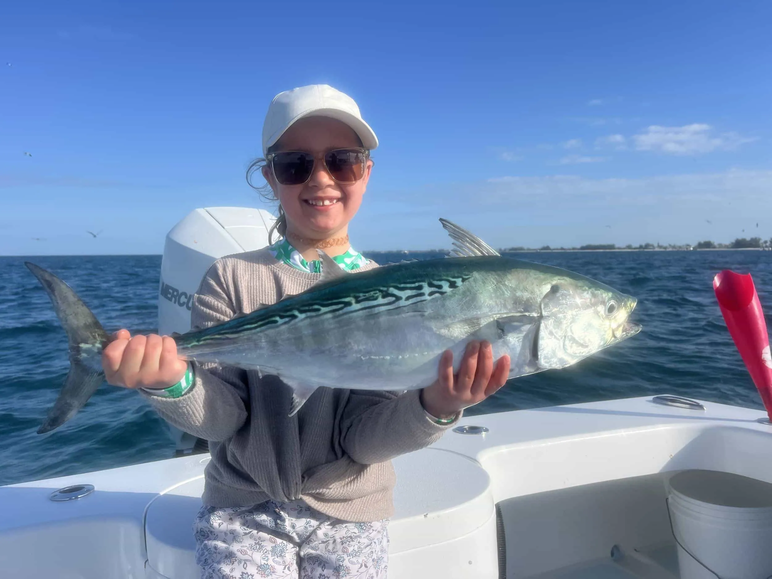 Client with a nearshore catch aboard the boat